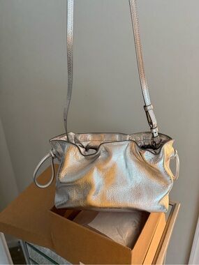 Stuart Weitzman Metallic Silver Drawstring Crossbody Bag